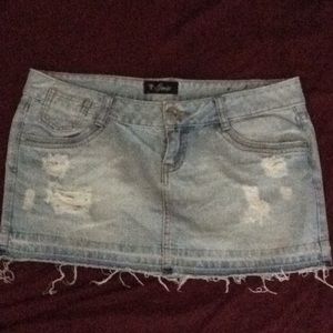 Ripped denim mini skirt